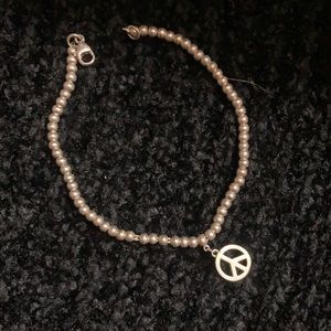 Authentic Tiffany and company peace sign bracelet